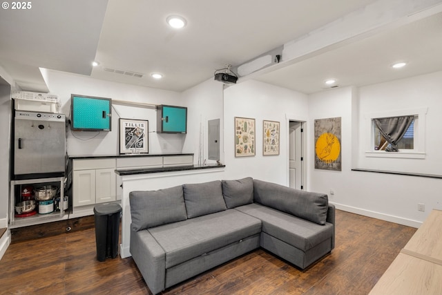 709 10th St, Oregon City, OR 97045 - living area featuring dark wood-type flooring, baseboards, recessed lighting, and electric panel
