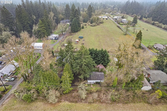 aerial view with a wooded view