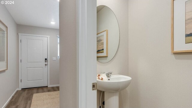 6138 SE 15th St, Gresham, OR 97080 - bathroom featuring wood finished floors, baseboards, a sink, and recessed lighting