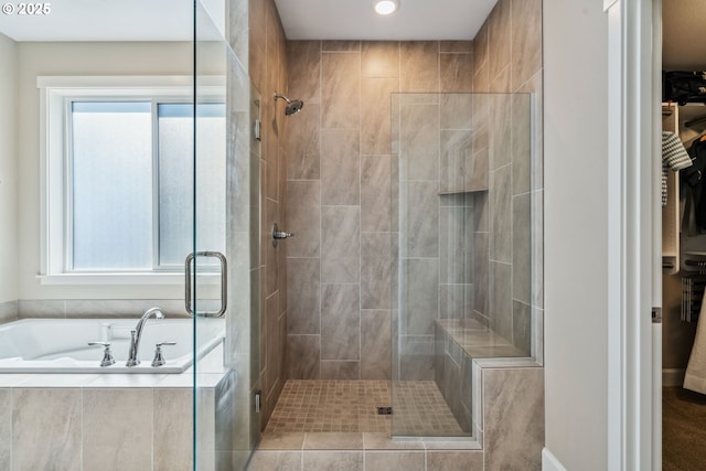 4905 S 12th Cir, Ridgefield, WA 98642 - full bath with a stall shower, plenty of natural light, a garden tub, and a spacious closet