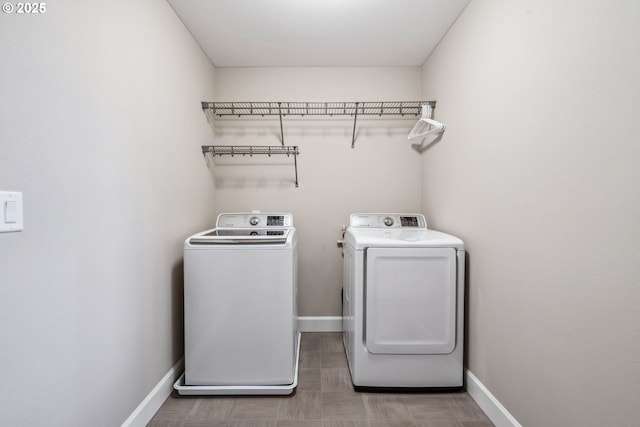 4905 S 12th Cir, Ridgefield, WA 98642 - laundry area with washing machine and dryer and baseboards