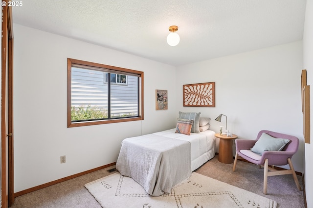 2027 SE Lexington St, Portland, OR 97202 - carpeted bedroom featuring baseboards