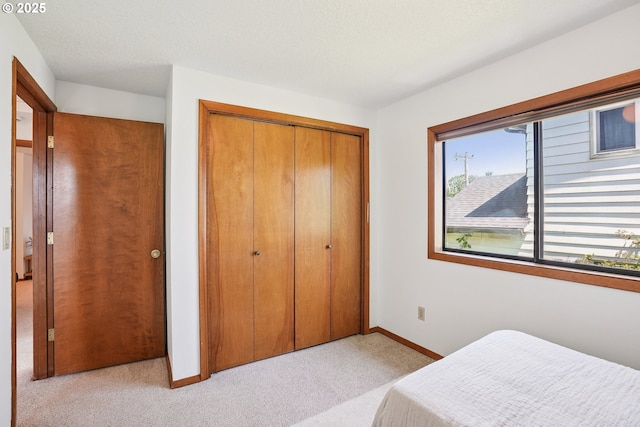 2027 SE Lexington St, Portland, OR 97202 - bedroom with light colored carpet and a closet