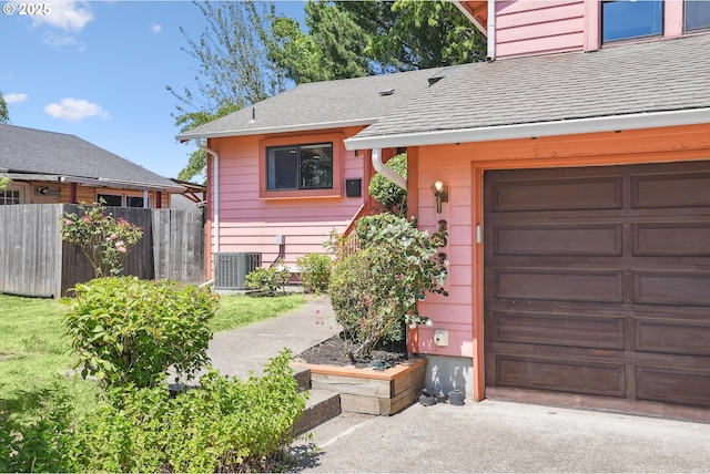 2027 SE Lexington St, Portland, OR 97202 - view of front of house with roof with shingles and a garage
