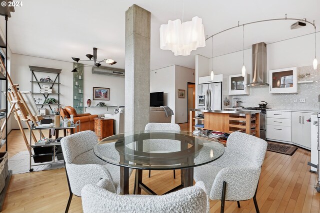 333 NW 9th Ave Unit 1205, Portland, OR 97209 - dining space featuring light wood-style flooring and ceiling fan
