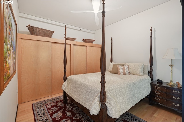 333 NW 9th Ave Unit 1205, Portland, OR 97209 - bedroom with wood finished floors and a ceiling fan