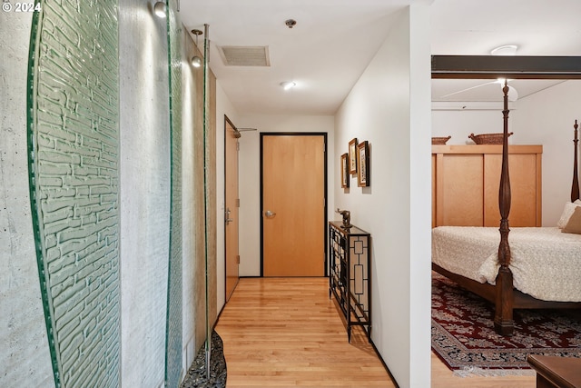 333 NW 9th Ave Unit 1205, Portland, OR 97209 - hallway featuring light wood-style flooring