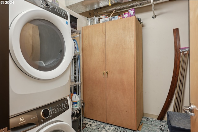 333 NW 9th Ave Unit 1205, Portland, OR 97209 - clothes washing area featuring estacked washer and dryer