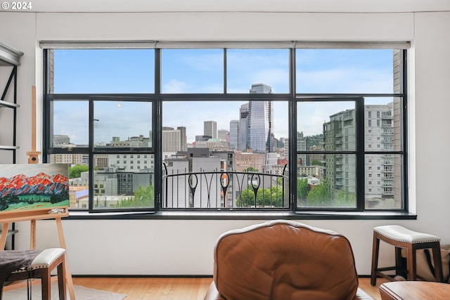 333 NW 9th Ave Unit 1205, Portland, OR 97209 - interior space with a view of skyline and wood finished floors