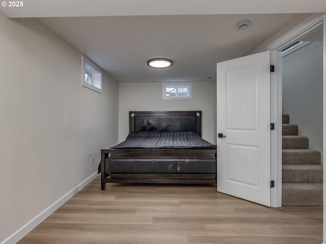 bedroom with light hardwood / wood-style flooring