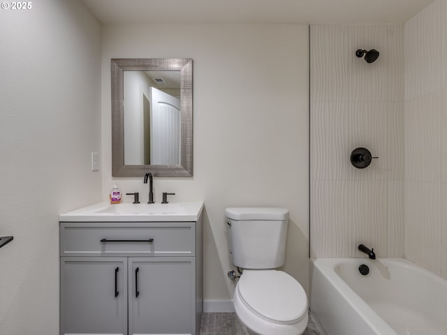 full bathroom featuring toilet, vanity, and tiled shower / bath