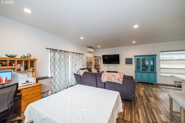 213 SE 1st Ave, Battle Ground, WA 98604 - bedroom with a wall mounted air conditioner, dark wood finished floors, and recessed lighting