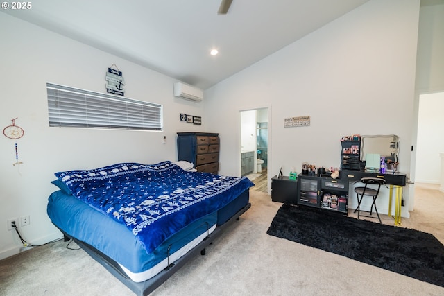 213 SE 1st Ave, Battle Ground, WA 98604 - bedroom with a wall mounted air conditioner, carpet floors, high vaulted ceiling, connected bathroom, and baseboards