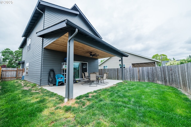 213 SE 1st Ave, Battle Ground, WA 98604 - rear view of house featuring a ceiling fan and a patio area