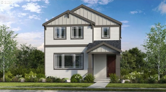 view of front of property featuring board and batten siding, a front yard, and roof with shingles