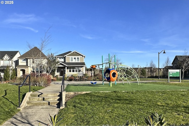 view of jungle gym featuring a residential view and a yard