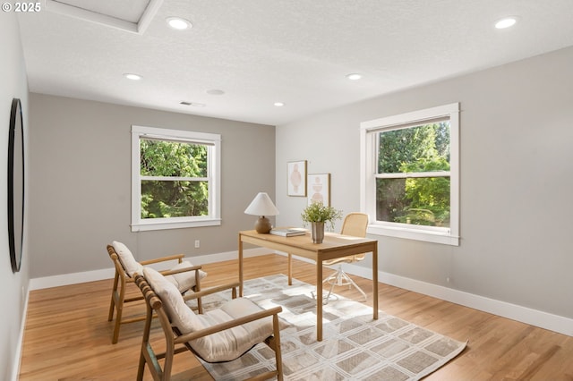 office area with baseboards, recessed lighting, and light wood-type flooring