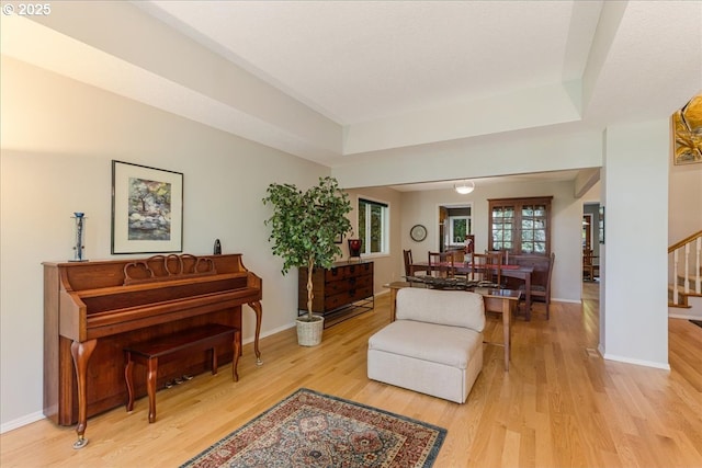 7445 SW Canyon Dr, Portland, OR 97225 - living area featuring stairs, light wood finished floors, and a tray ceiling