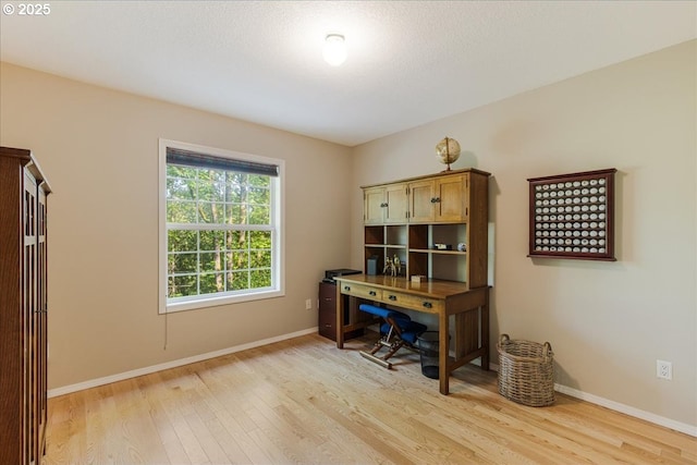 7445 SW Canyon Dr, Portland, OR 97225 - home office with light wood-style floors and baseboards