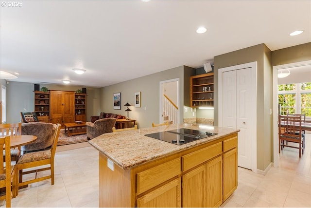 7445 SW Canyon Dr, Portland, OR 97225 - kitchen featuring black electric stovetop, open shelves, open floor plan, light stone counters, and light tile patterned flooring