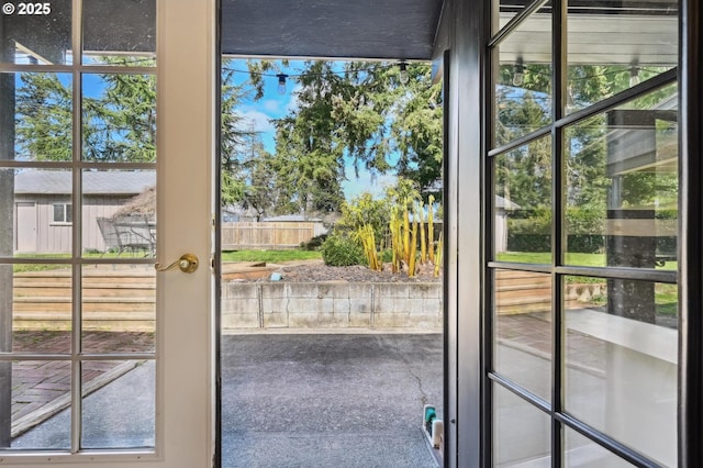 doorway to outside featuring a wealth of natural light