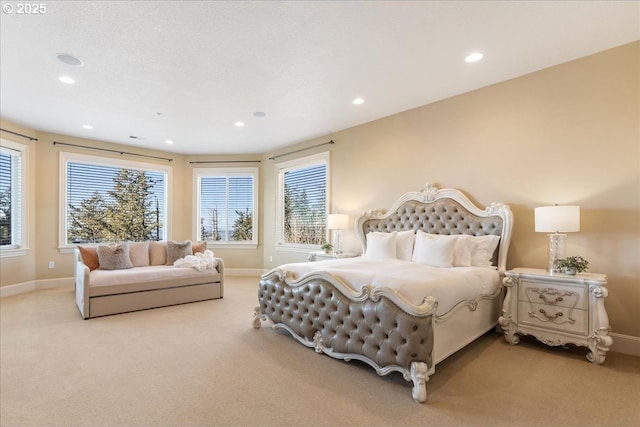 bedroom featuring baseboards, recessed lighting, and carpet