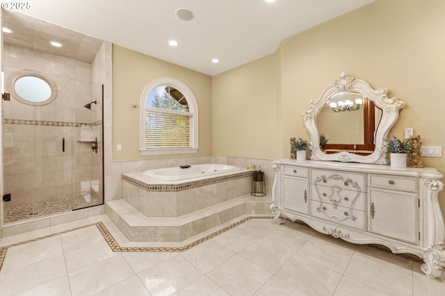 bathroom with a garden tub, recessed lighting, a stall shower, and vanity
