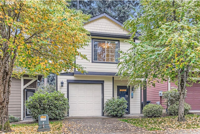 8006 SE Sporri Ln, Milwaukie, OR 97267 - view of front of home with a garage and driveway
