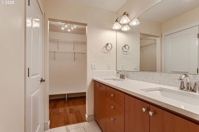 8006 SE Sporri Ln, Milwaukie, OR 97267 - full bathroom featuring double vanity, backsplash, and a spacious closet