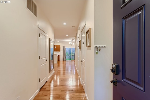 8006 SE Sporri Ln, Milwaukie, OR 97267 - corridor featuring recessed lighting, light wood-style flooring, and baseboards