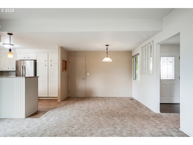 interior space featuring carpet flooring