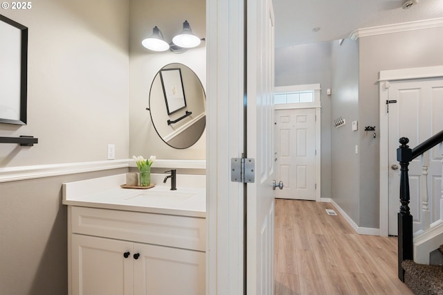 2233 NW Oxford St, Camas, WA 98607 - bathroom featuring wood finished floors, vanity, and baseboards