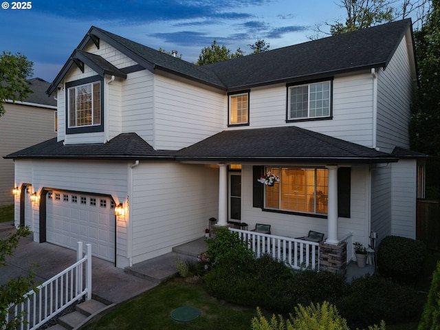 2233 NW Oxford St, Camas, WA 98607 - traditional home featuring a garage, a porch, and concrete driveway
