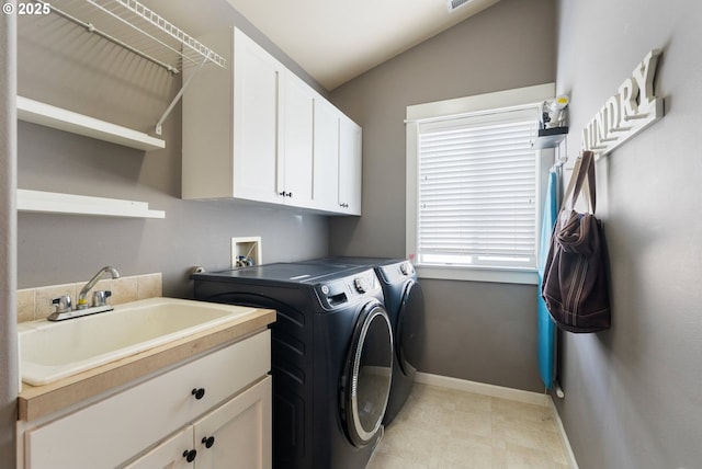 2233 NW Oxford St, Camas, WA 98607 - laundry area featuring washer and clothes dryer, cabinet space, and baseboards
