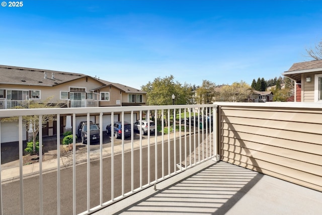 balcony featuring a residential view