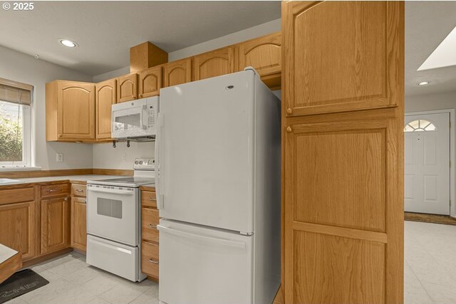 366 Pintail Ave SE, Salem, OR 97306 - kitchen featuring light countertops, white appliances, and recessed lighting