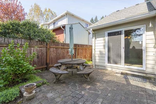 366 Pintail Ave SE, Salem, OR 97306 - view of patio / terrace featuring fence and outdoor dining space