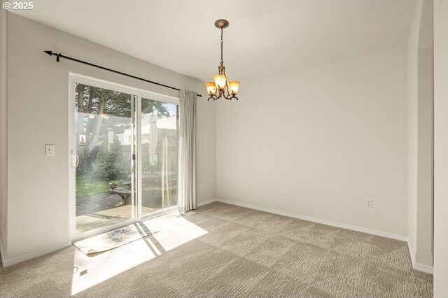 366 Pintail Ave SE, Salem, OR 97306 - spare room with a chandelier, baseboards, and light colored carpet