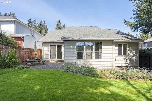 366 Pintail Ave SE, Salem, OR 97306 - back of property with a yard, a shingled roof, a patio, and fence