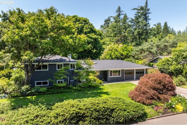 15 SW 95th Ave, Portland, OR 97225 - view of front of property with a garage, a front lawn, and driveway