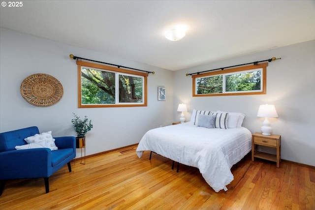 15 SW 95th Ave, Portland, OR 97225 - bedroom with light wood-style floors and baseboards