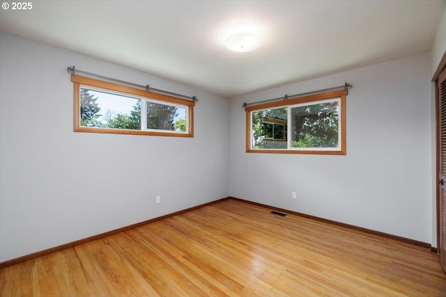 15 SW 95th Ave, Portland, OR 97225 - empty room featuring baseboards and light wood finished floors
