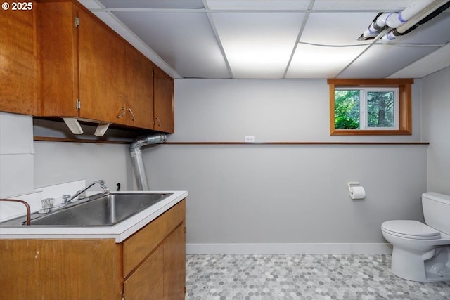 15 SW 95th Ave, Portland, OR 97225 - laundry area featuring baseboards and tile patterned floors