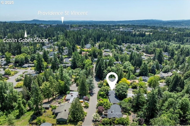 15 SW 95th Ave, Portland, OR 97225 - aerial view of property and surrounding area featuring a forest