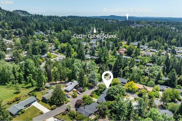 15 SW 95th Ave, Portland, OR 97225 - aerial view of residential area with a heavily wooded area