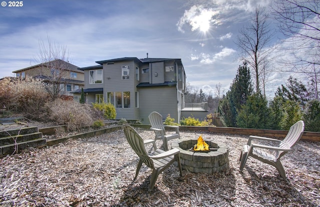 exterior space with an outdoor fire pit