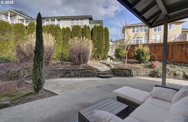 view of patio / terrace with a fenced backyard and an outdoor living space