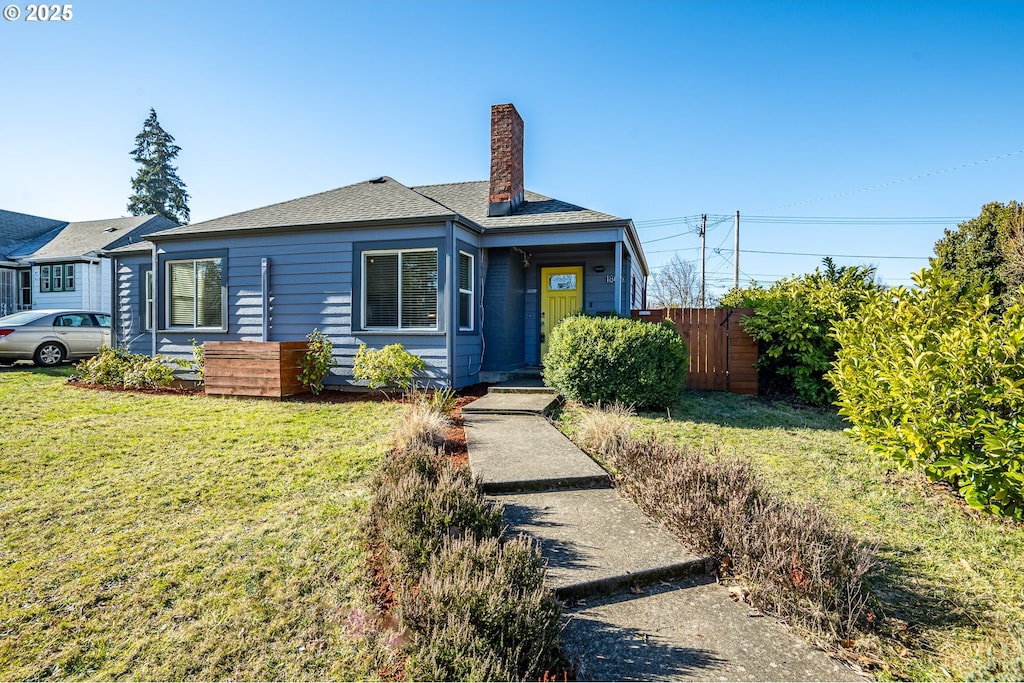 view of front of house with a front yard