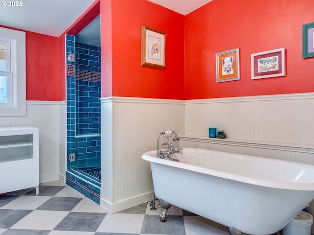 3843 SE 41st Ave SE, Portland, OR 97202 - bathroom featuring wainscoting, a freestanding bath, a stall shower, and tile patterned floors