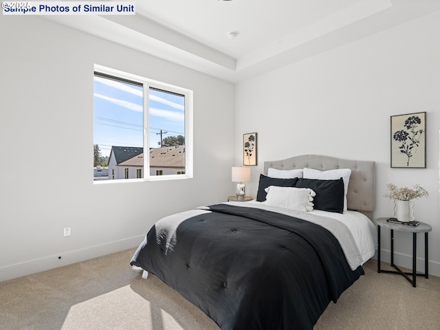 1218 SE Center St Unit 3, Portland, OR 97202 - bedroom featuring carpet, baseboards, and a raised ceiling